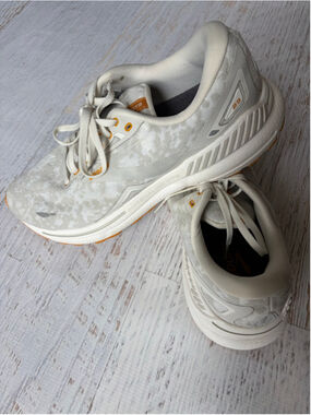 Women's Brooks Adrenaline GTS 23 Sneakers in White and Orange/Yellow